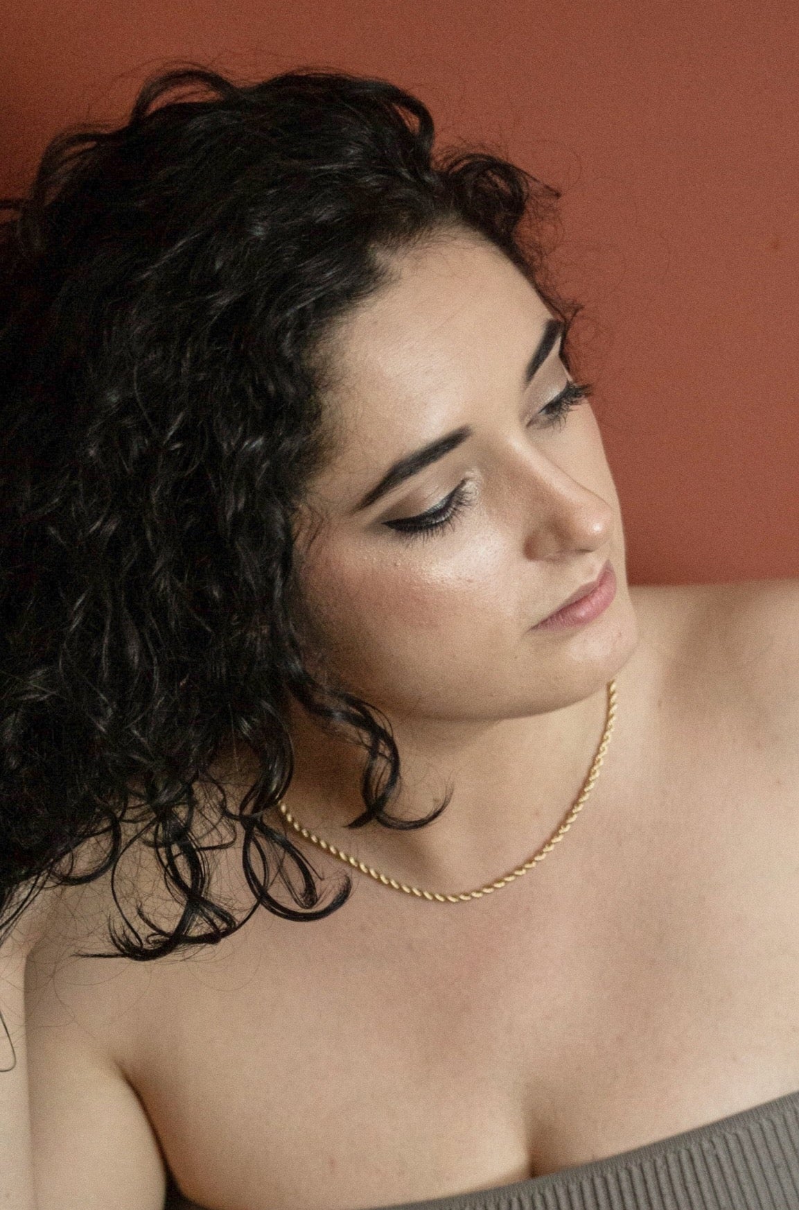 Front view of a model wearing the necklace.