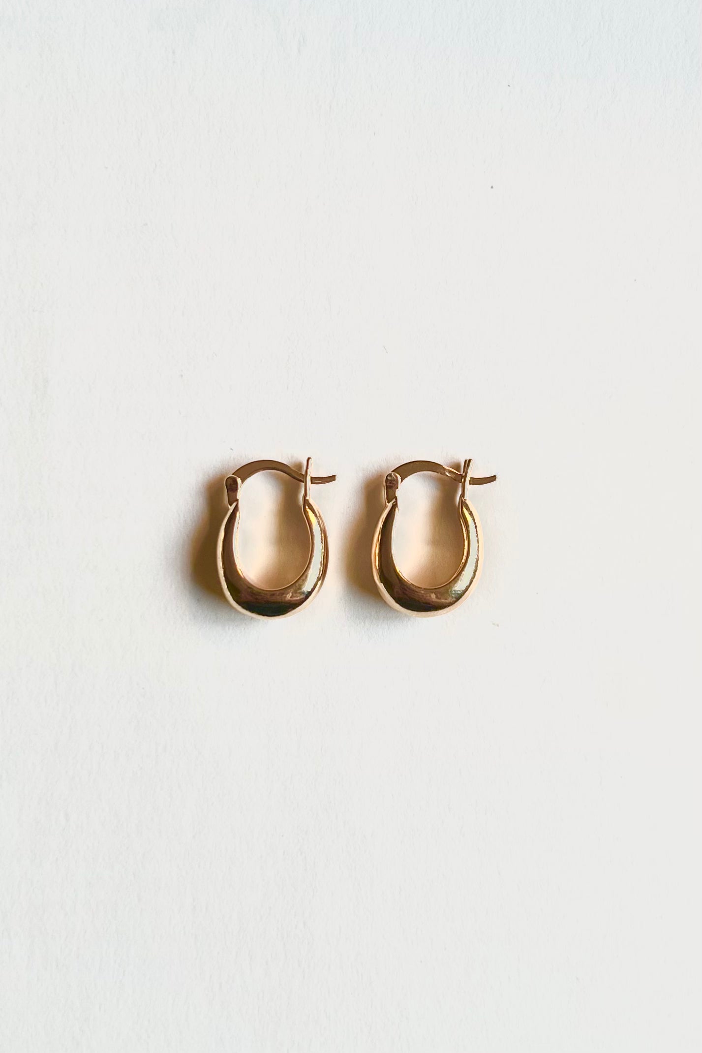 Top view of the olive hoops, photographed on a white background.